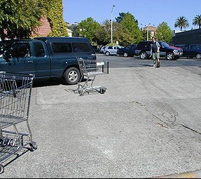 half_pipe-approach Half Pipe sizes up his approach. He focuses so that he can get in the "zone" before carrying out an abuse event. To the unobservant shoppers in the lot he is just another skateboarder.